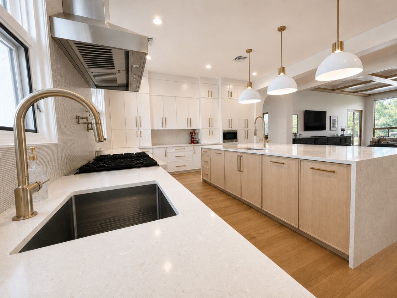 Cheney kitchen renovation, oversized island with brass fixtures