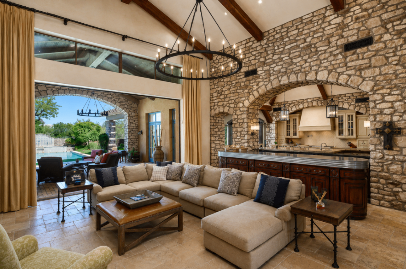 DC Ranch Villa, living room opening to pool terrace