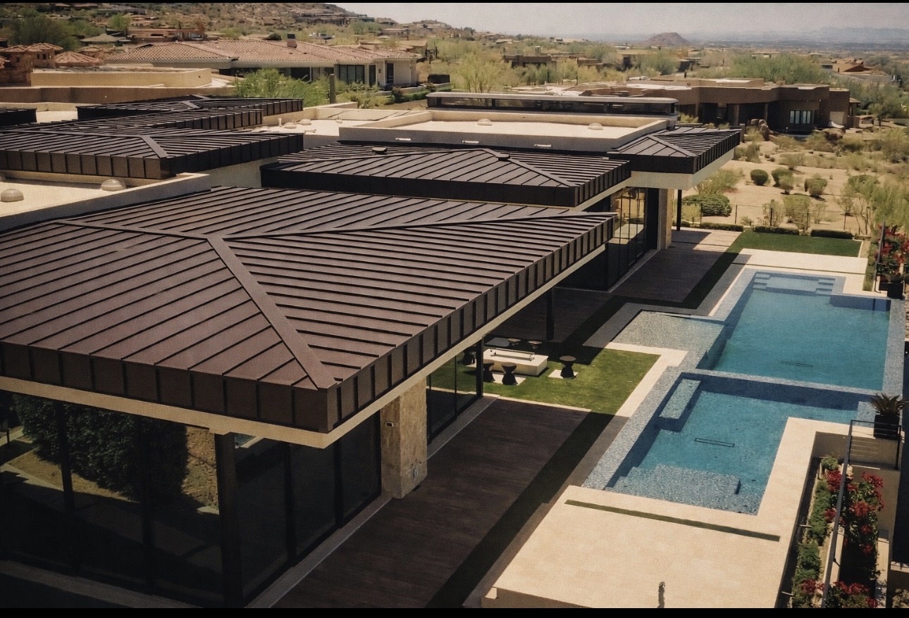 La Senda, aerial view of the home with infinity pool and mountain backdrop
