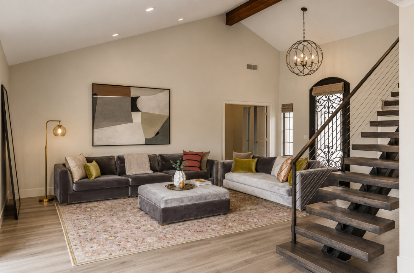 Caron Street, living room with oversized art wall and lounge seating
